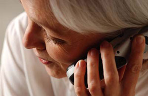 Woman calling Eastern Rehab Services to schedule an appointment for her therapeutic services Woman calling Eastern Rehab Services to schedule an appointment for her therapeutic services