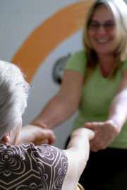 Physical therapist working with a patient. Physical therapist working with a patient.